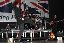 Vance in action on stage with Herman's Hermits.Click for a larger image
